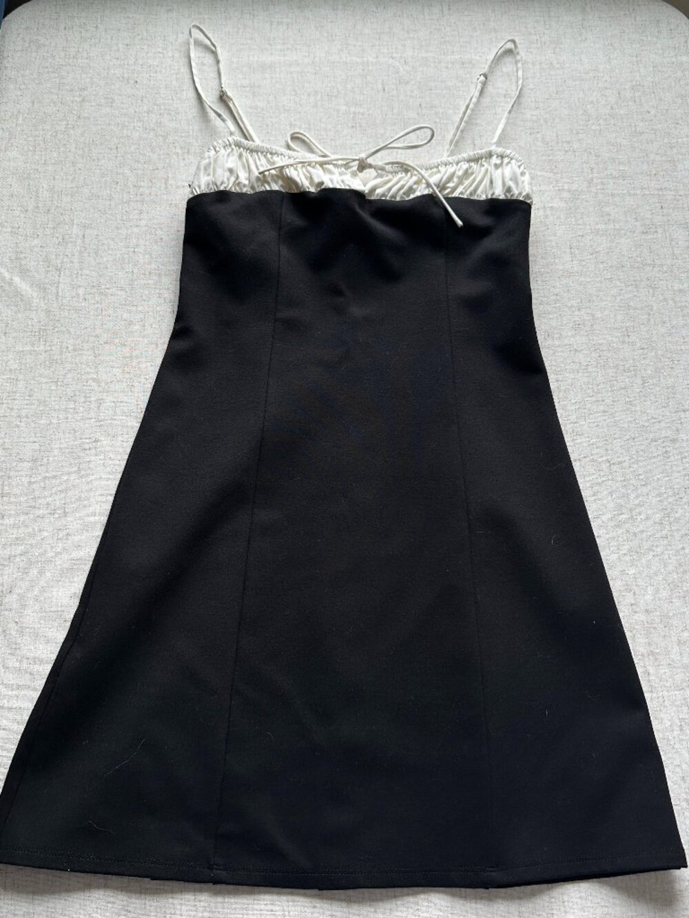 Reformation Black mini dress with white bodice trim